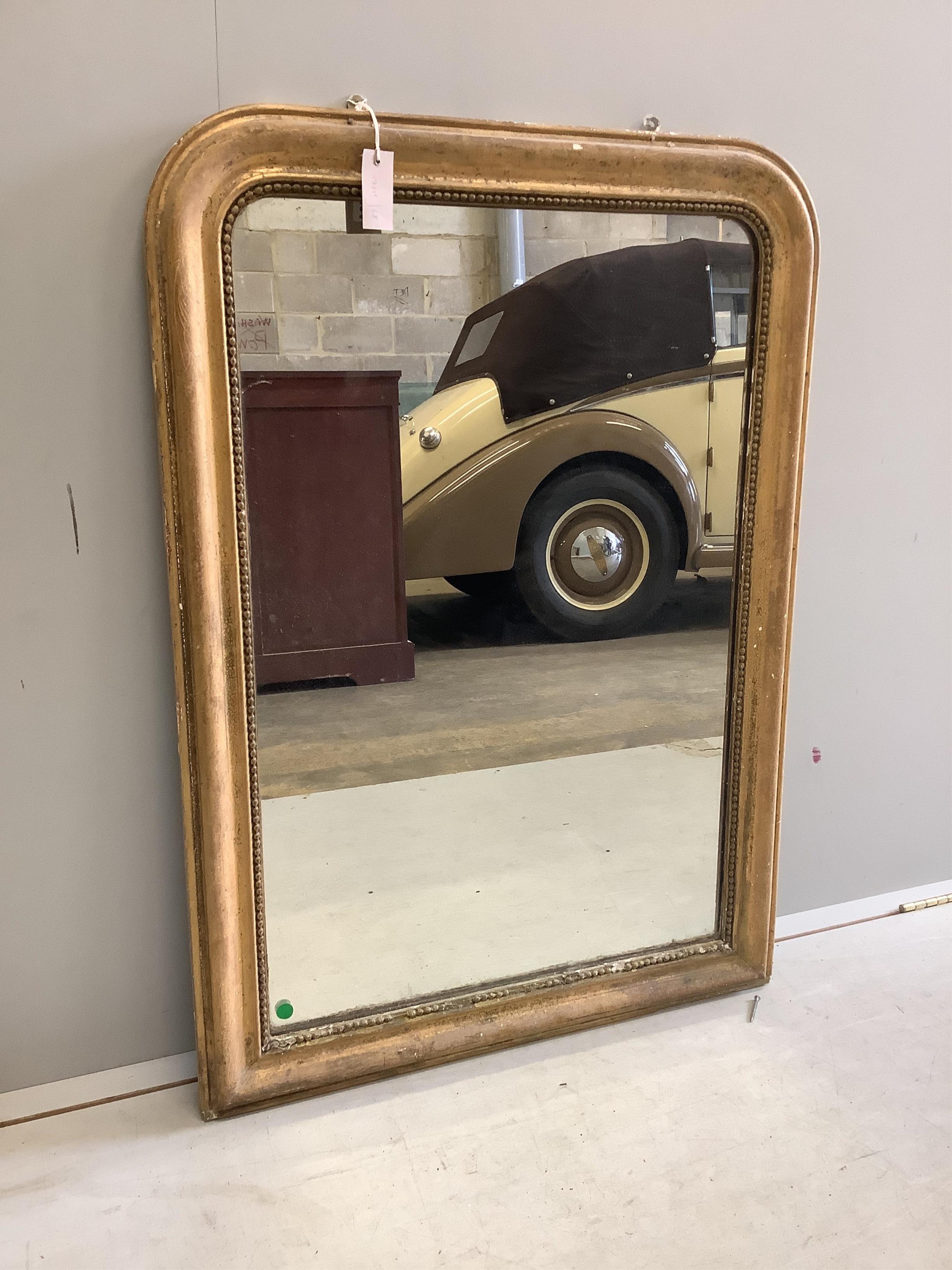 A 19th century French giltwood composition overmantel mirror, width 74cm, height 105cm. Condition - poor
